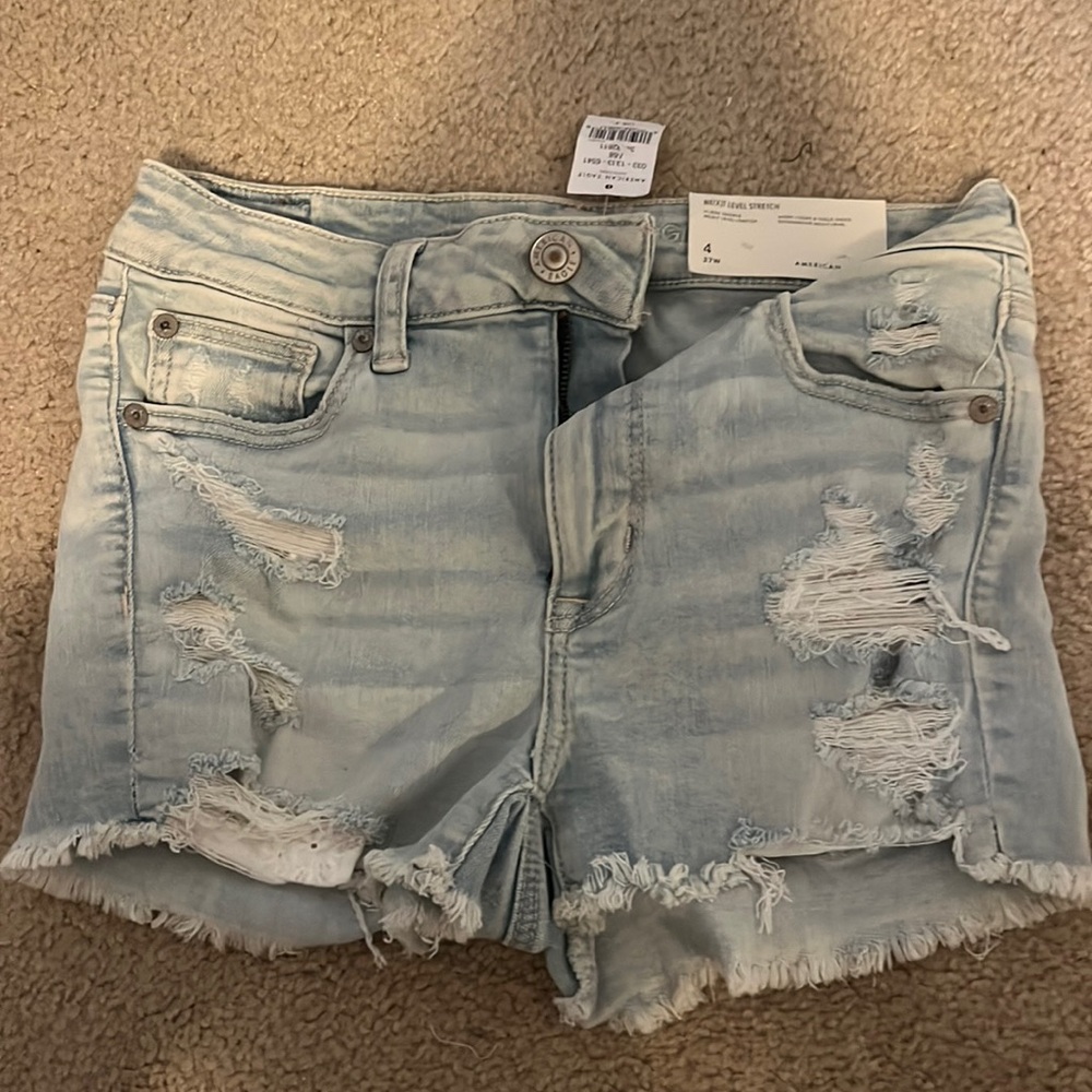 American Eagle high-rise denim shorts size 4 with lace pockets